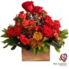 caja tonos rojos de Floristeria San Lorenzo